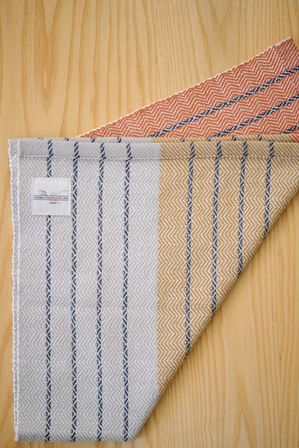  Unique color combinations and organic patterns are cultivated within these textiles. 
